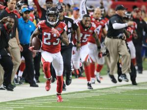 RETRANSMISSION TO CORRECT DAY TO SUNDAY - Atlanta Falcons cornerback Robert Alford intercepts Washington Redskins quarterback Kirk Cousins during overtime and returns the ball for the game winning touchdown in an NFL football game, Sunday, Oct. 11, 2015 in Atlanta. (Curtis Compton/Atlanta Journal-Constitution via AP)  MARIETTA DAILY OUT; GWINNETT DAILY POST OUT; LOCAL TELEVISION OUT; WXIA-TV OUT; WGCL-TV OUT; MANDATORY CREDIT