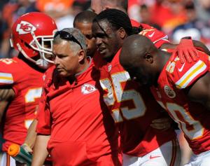Kansas City Chiefs running back Jamaal Charles (25) is helped off the field after an injury in the second half of an NFL football game against the Chicago Bears in Kansas City, Mo., Sunday, Oct. 11, 2015. (AP Photo/Ed Zurga)