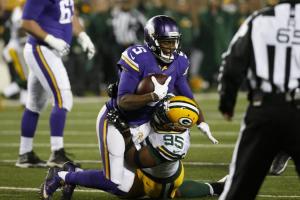 Green Bay Packers defensive end Datone Jones (95) sacked Minnesota Vikings quarterback Teddy Bridgewater (5) during the second half of an NFL football game in Minneapolis, Sunday, Nov. 22, 2015. (AP Photo/Ann Heisenfelt)
