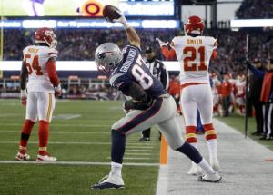 New England Patriots tight end Rob Gronkowski (87) celebrates his touchdown against the Kansas City Chiefs in the first half of an NFL divisional playoff football game, Saturday, Jan. 16, 2016, in Foxborough, Mass. (AP Photo/Steven Senne)